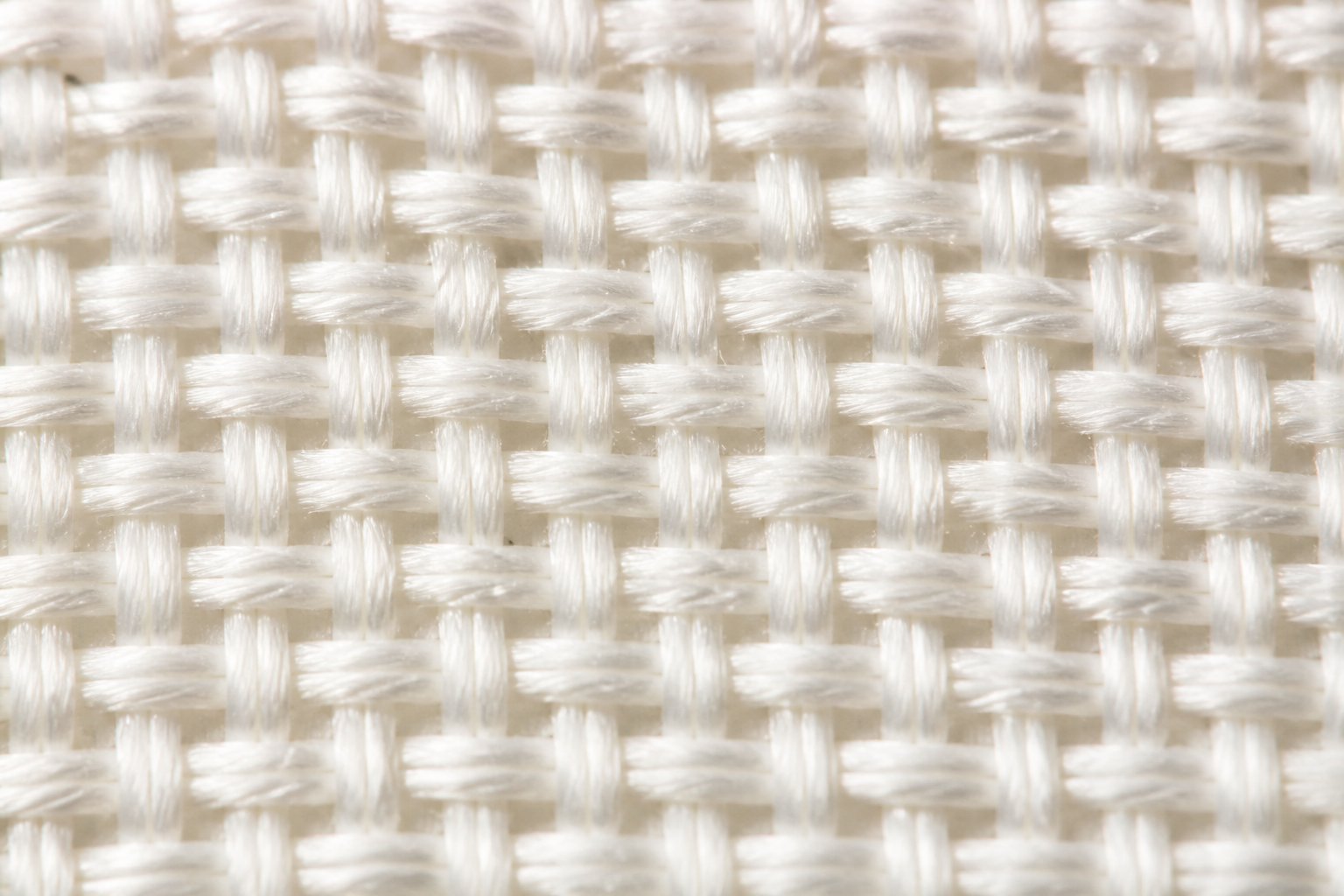 Macro close-up of plain weave nylon tablecloth fabric texture
