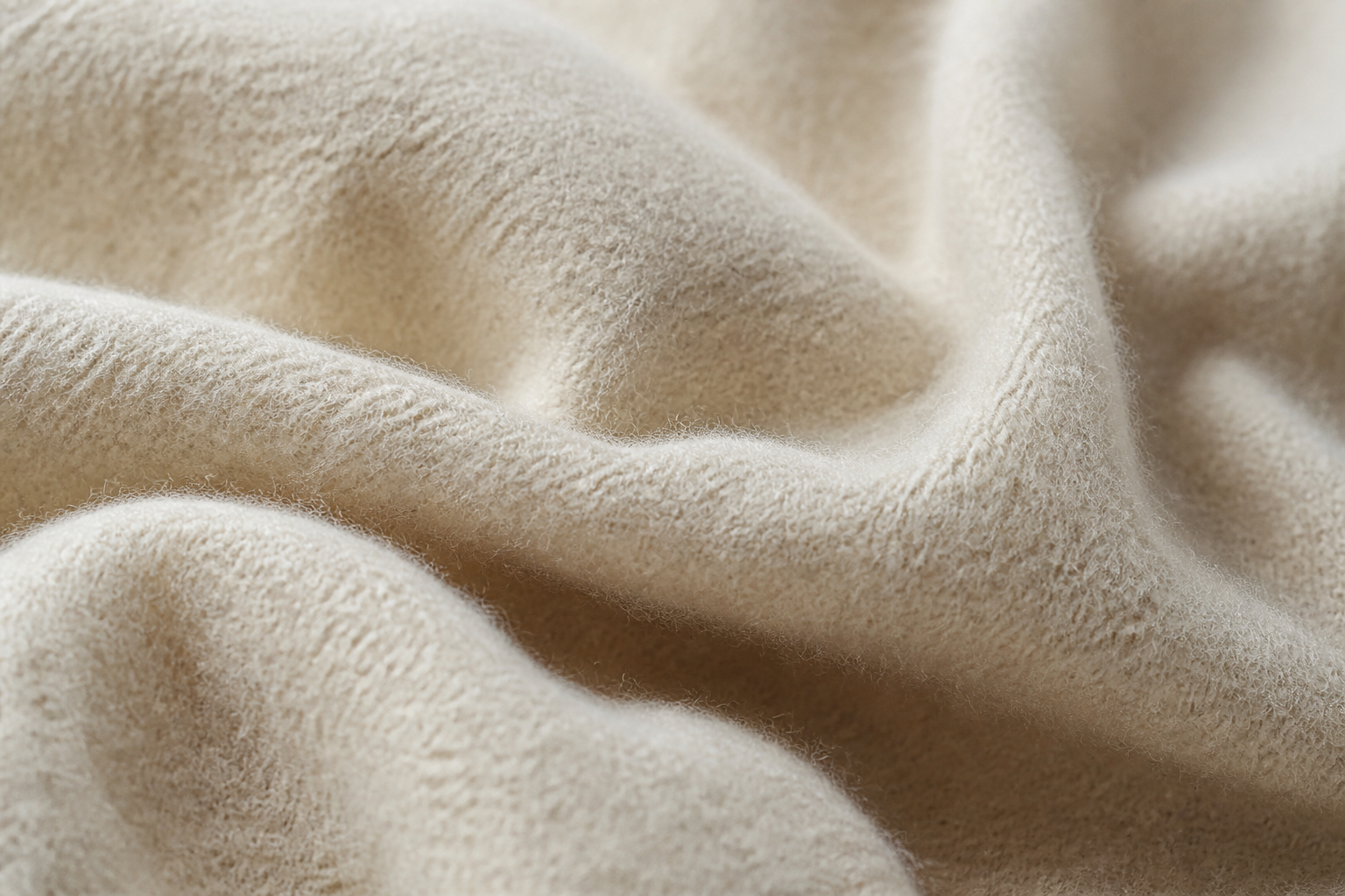 Macro close-up of brushed flannel fabric showing dense soft fibers