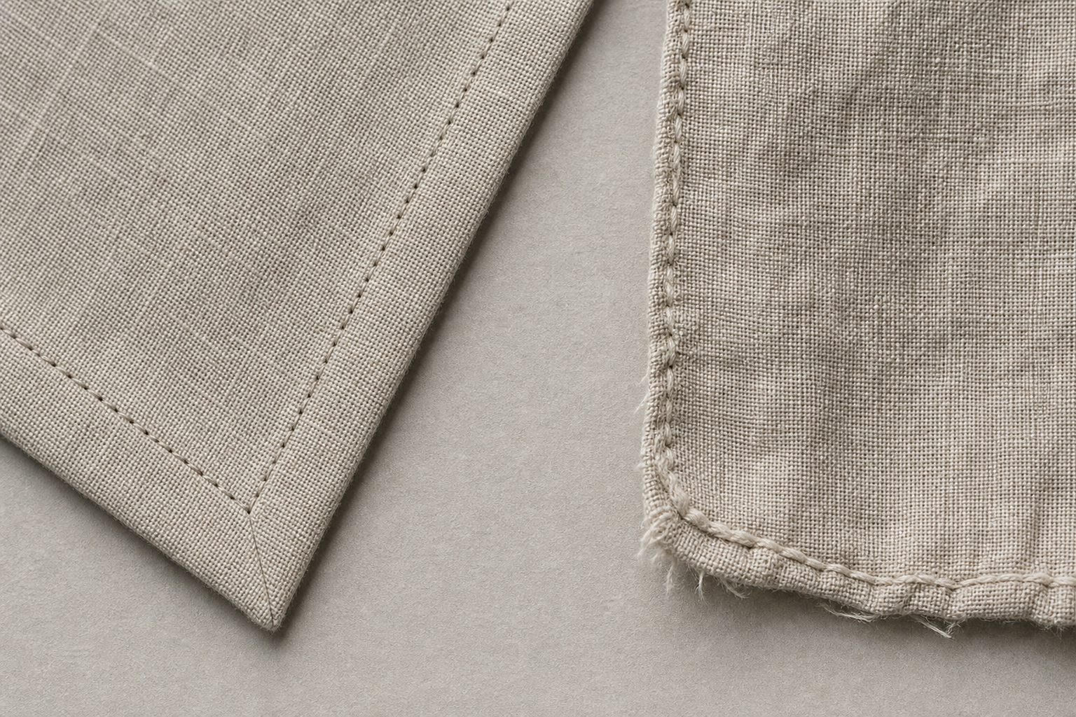 Close-up comparison of a crisp mitered linen corner and a loose rolled edge with fraying threads