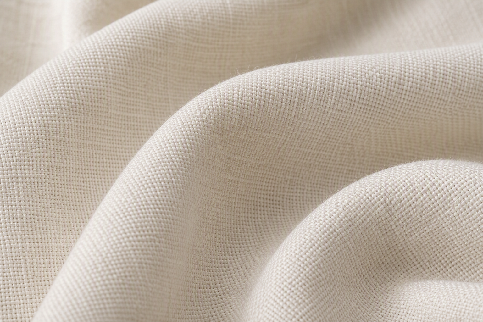 Macro close-up of spun polyester tablecloth fabric showing soft cotton-like woven texture