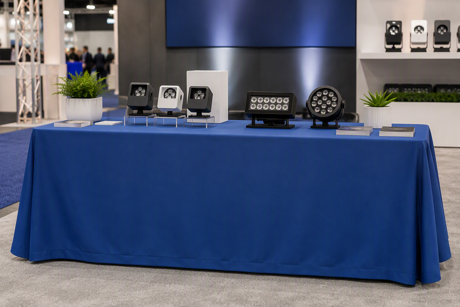 Trade show display table covered with a flat hemmed table skirt