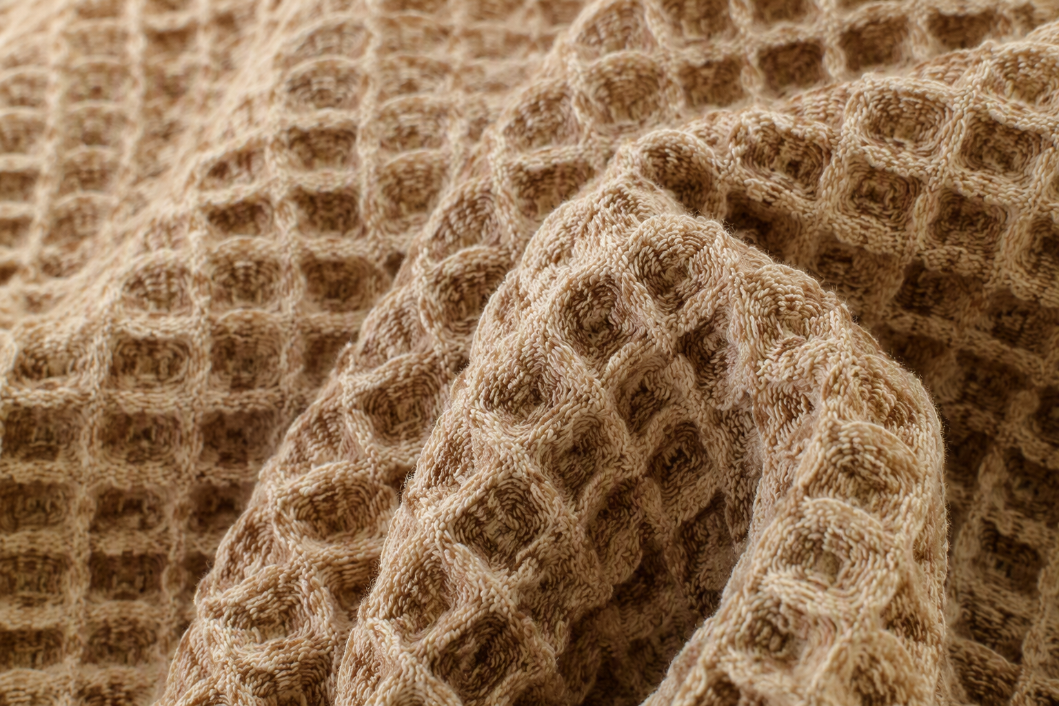 Waffle weave close-up showing the raised honeycomb grid