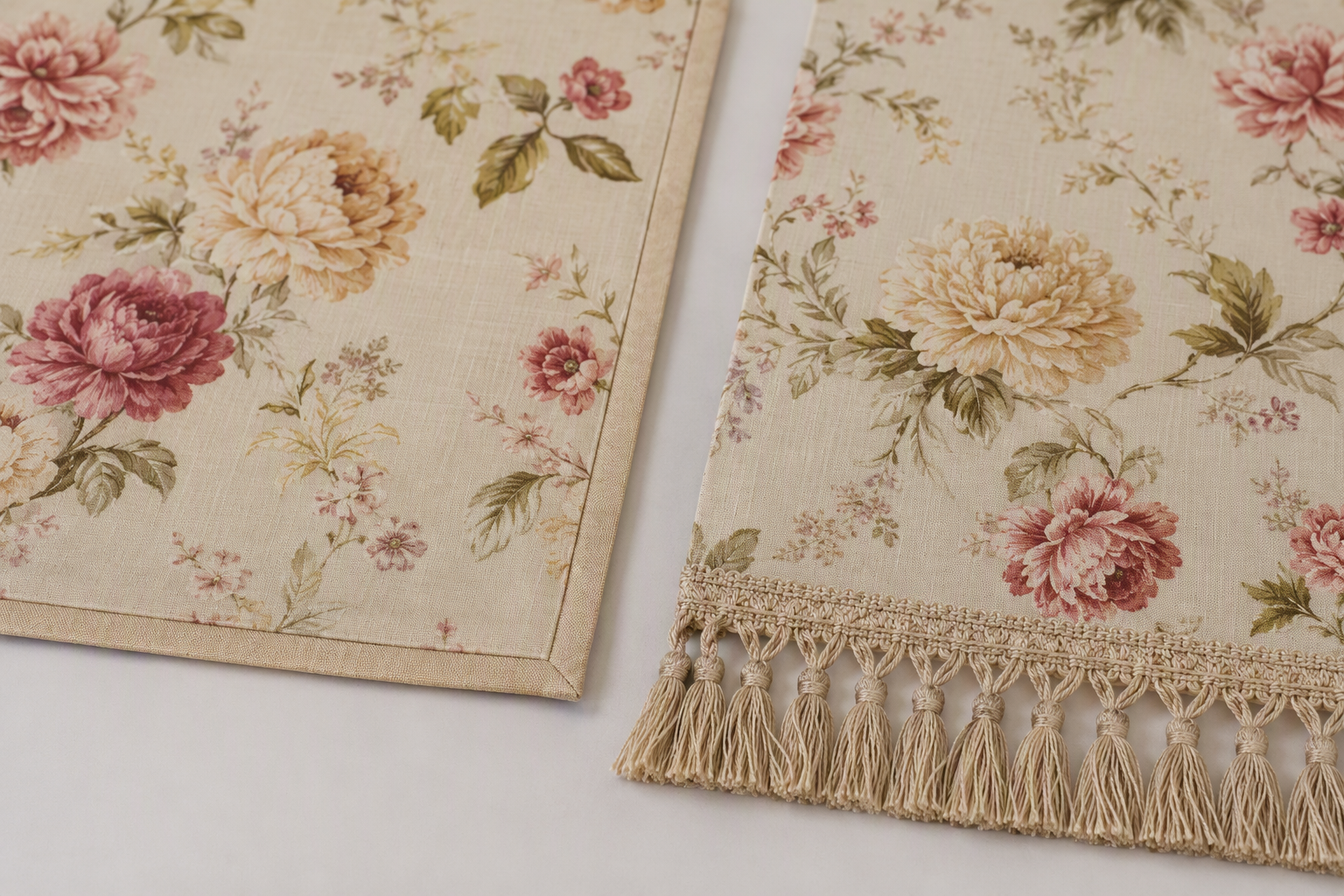 Two printed table runner ends, one with a clean bound hem and one with a tassel fringe