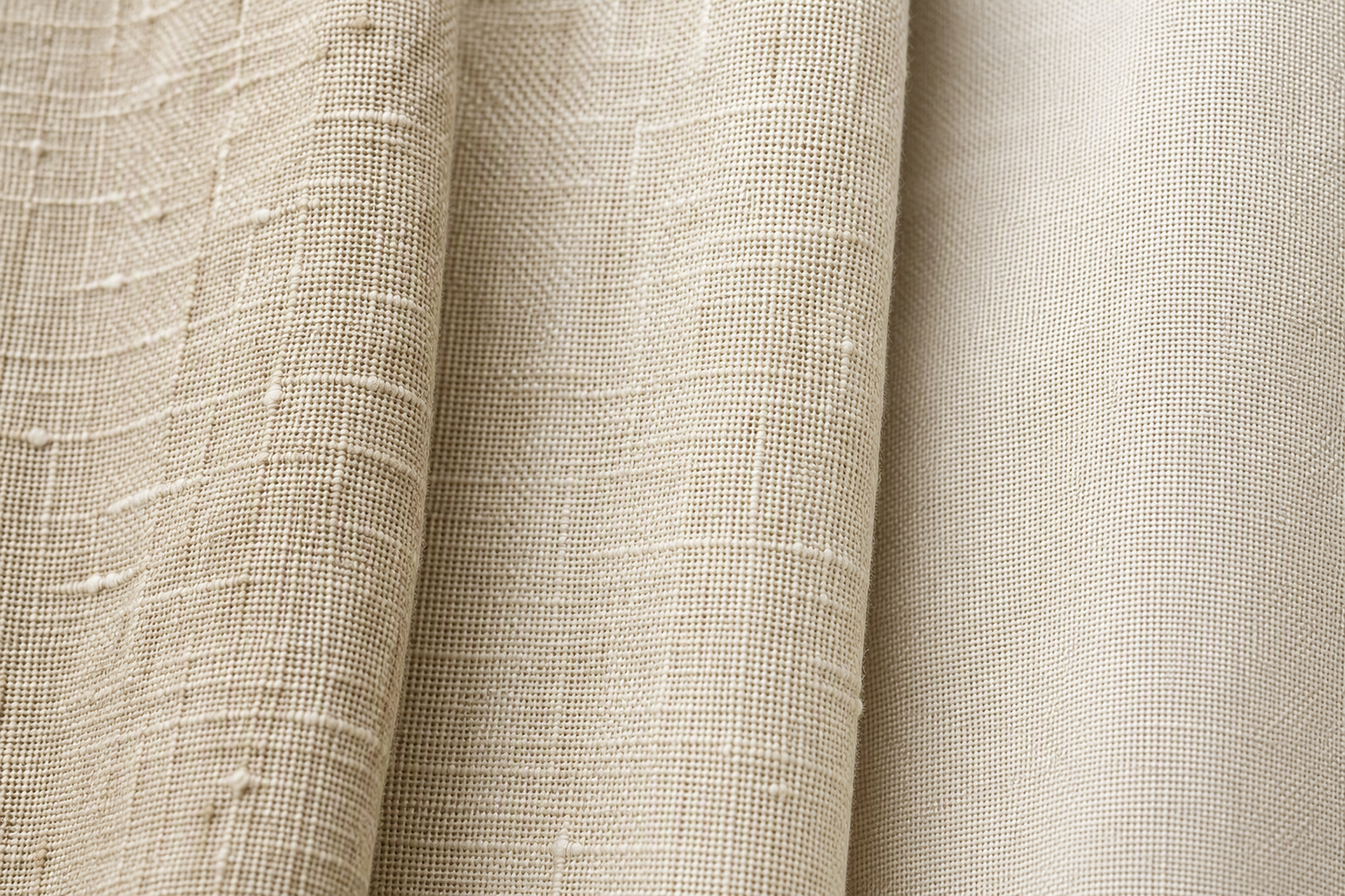 Genuine flax linen, cotton-linen blend and polyester faux linen weave compared side by side